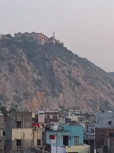 Amer Fort above Jaipur rooftops
