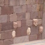 Figures inset into wall